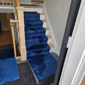 Moving company unloading household items in Hillhurst, Calgary.