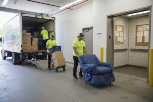 Vancouver condo movers coordinating elevator booking and loading dock access during a high-rise move.