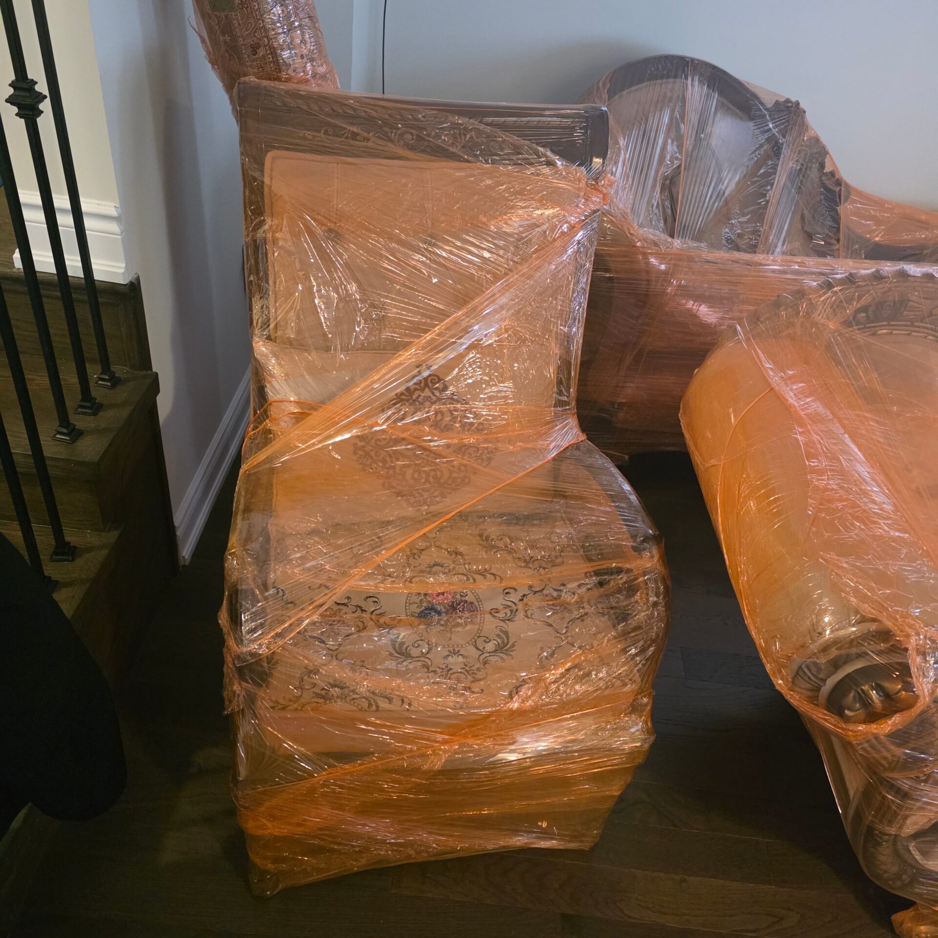 Glassware crates staged efficiently for transport during a Surrey move.