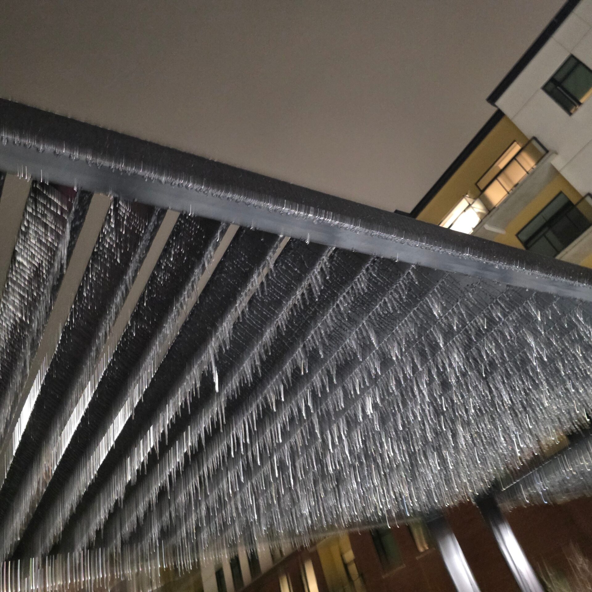 Movers carefully preparing home office electronics for a move from Yorkville to Midtown Toronto.