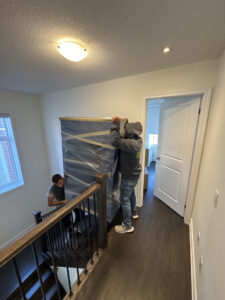 Protective floor runners used during a residential move in Halifax.