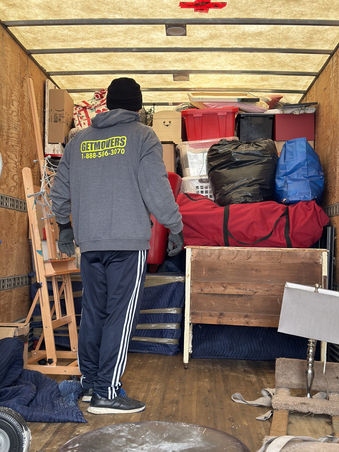 Crates containing porcelain bowls stacked safely in the truck.