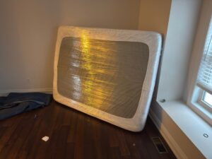 Experienced Montreal movers unloading items in Griffintown.