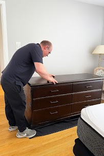 Movers carefully preparing furniture for a home move from Buttonville to Unionville in Markham, ensuring safe winter transit.