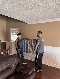 Movers carefully preparing furniture for a home move from Avalon to Fallingbrook in Orléans, ensuring safe winter transit.
