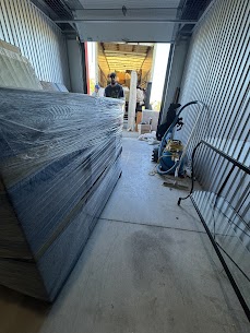 Movers carefully preparing furniture for a home move from Unionville to Cachet in Markham, ensuring safe winter transit.