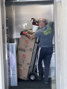 Movers carefully preparing furniture for a home move from Erindale Woodlands to Streetsville in Mississauga, ensuring safe winter transit.