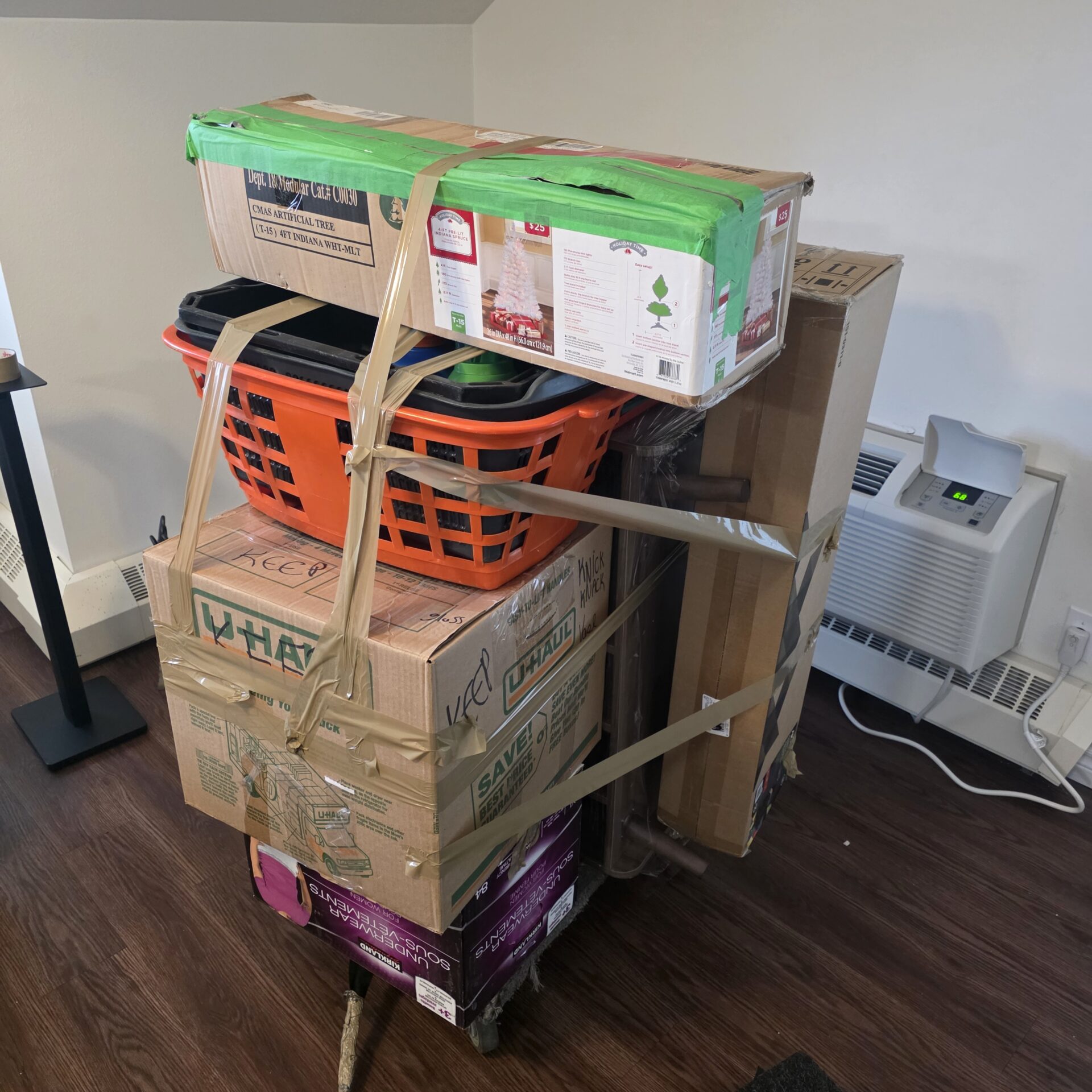 Wardrobe fully wrapped and protected for transit in Ottawa.