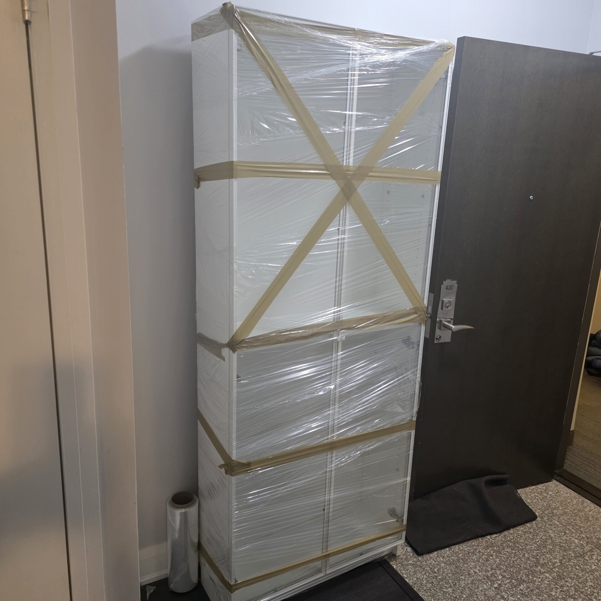 Porcelain plates secured in divider crates.