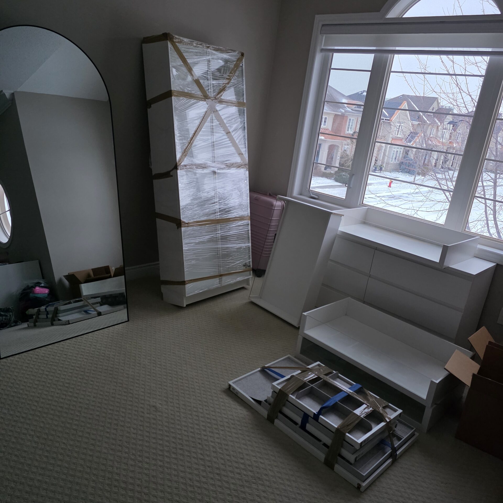 Porcelain dishes packed carefully in divider crates for an Ottawa move.