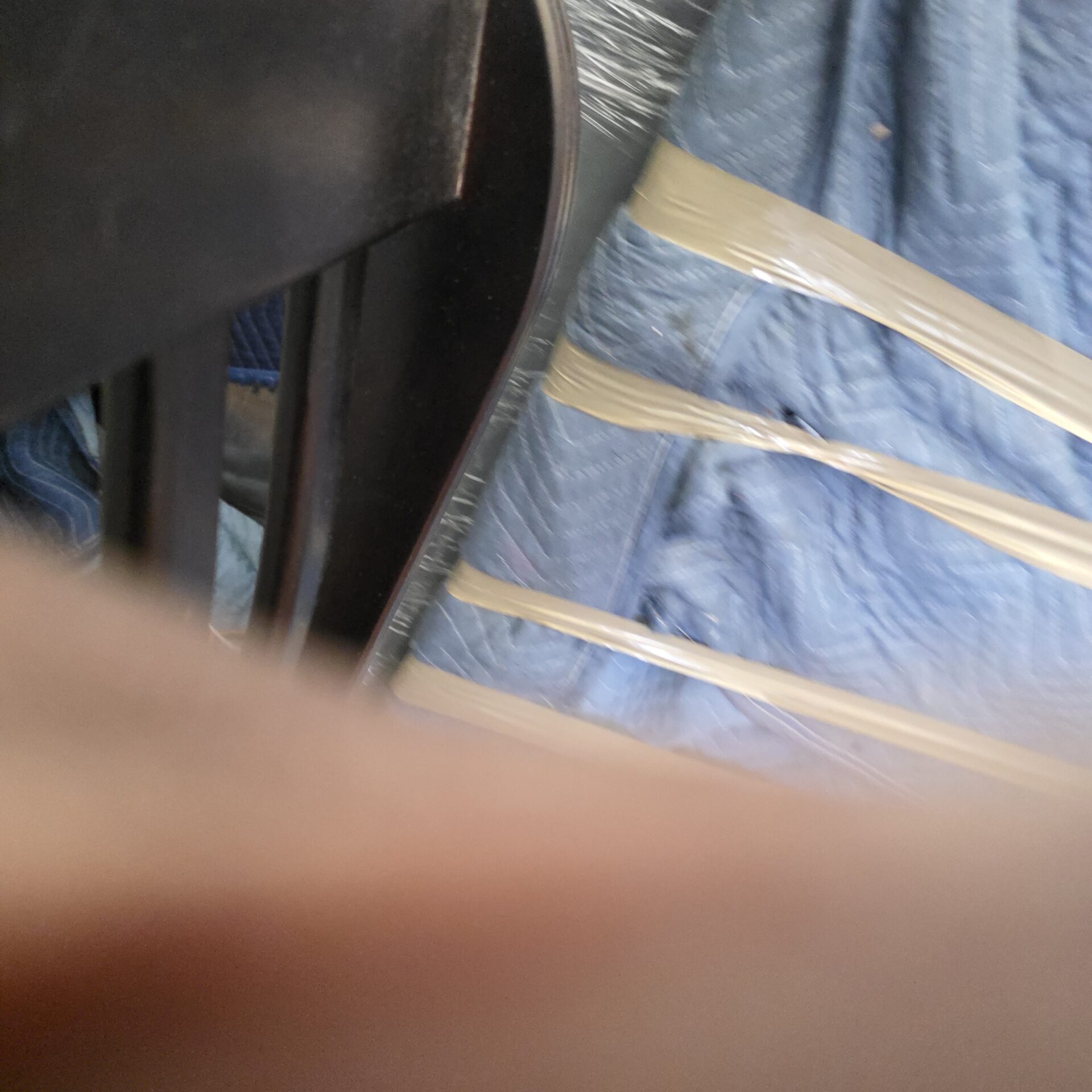 Professional movers maintaining clear pathways during the loading process in a Central Ajax home.