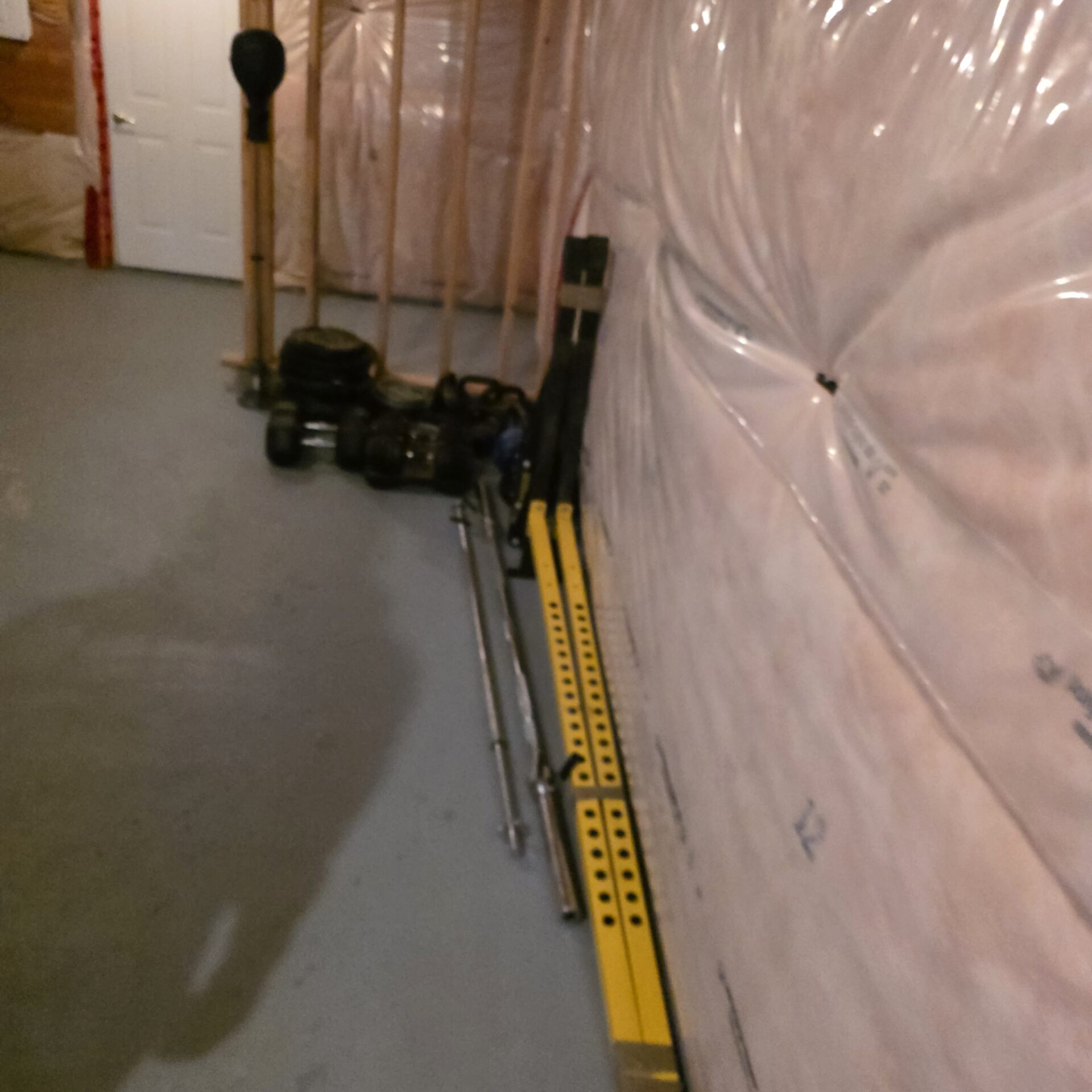 Professional movers maintaining clear winter pathways during the loading process in Etobicoke.