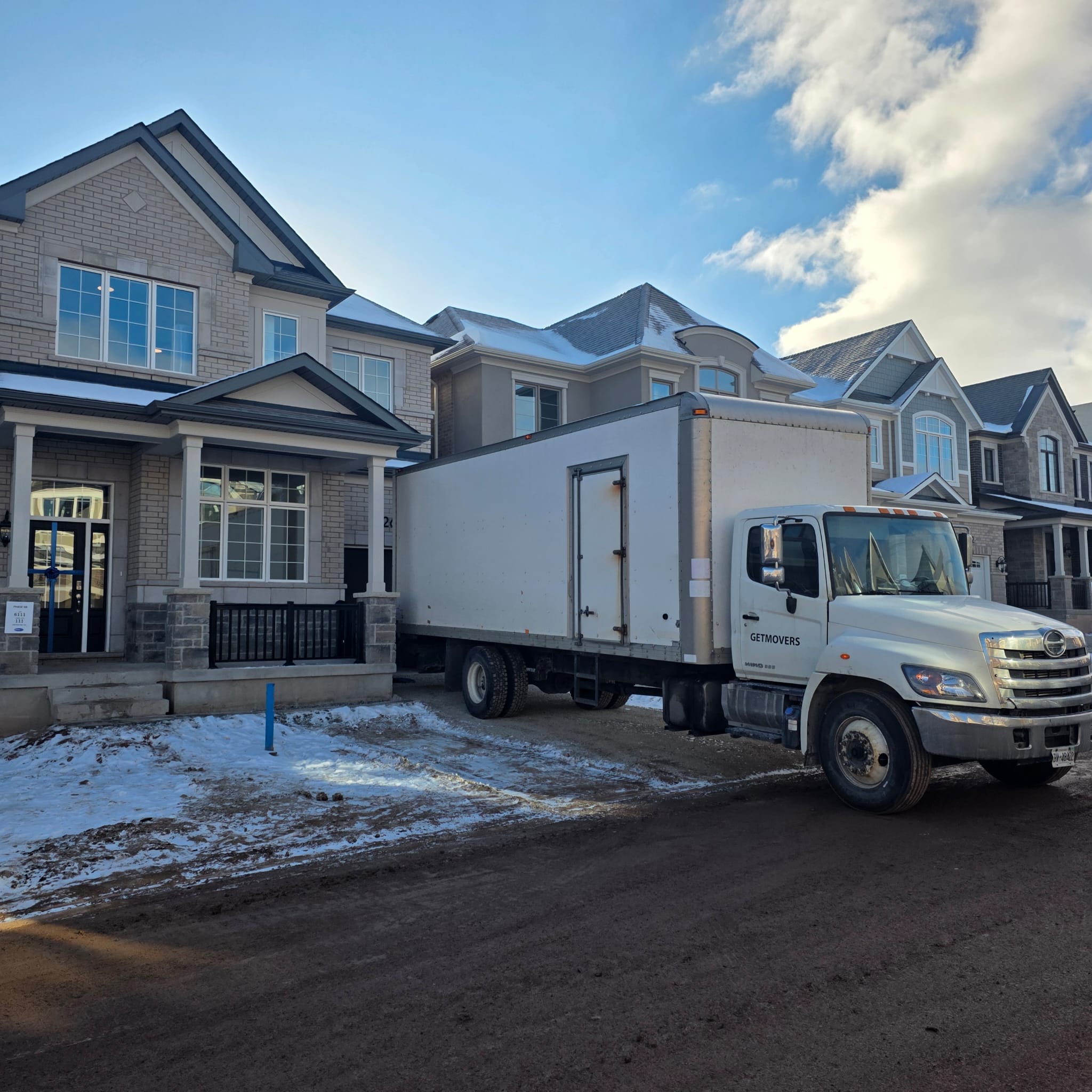 Larger furniture wrapped and secured for transit during a residential move in Ottawa.