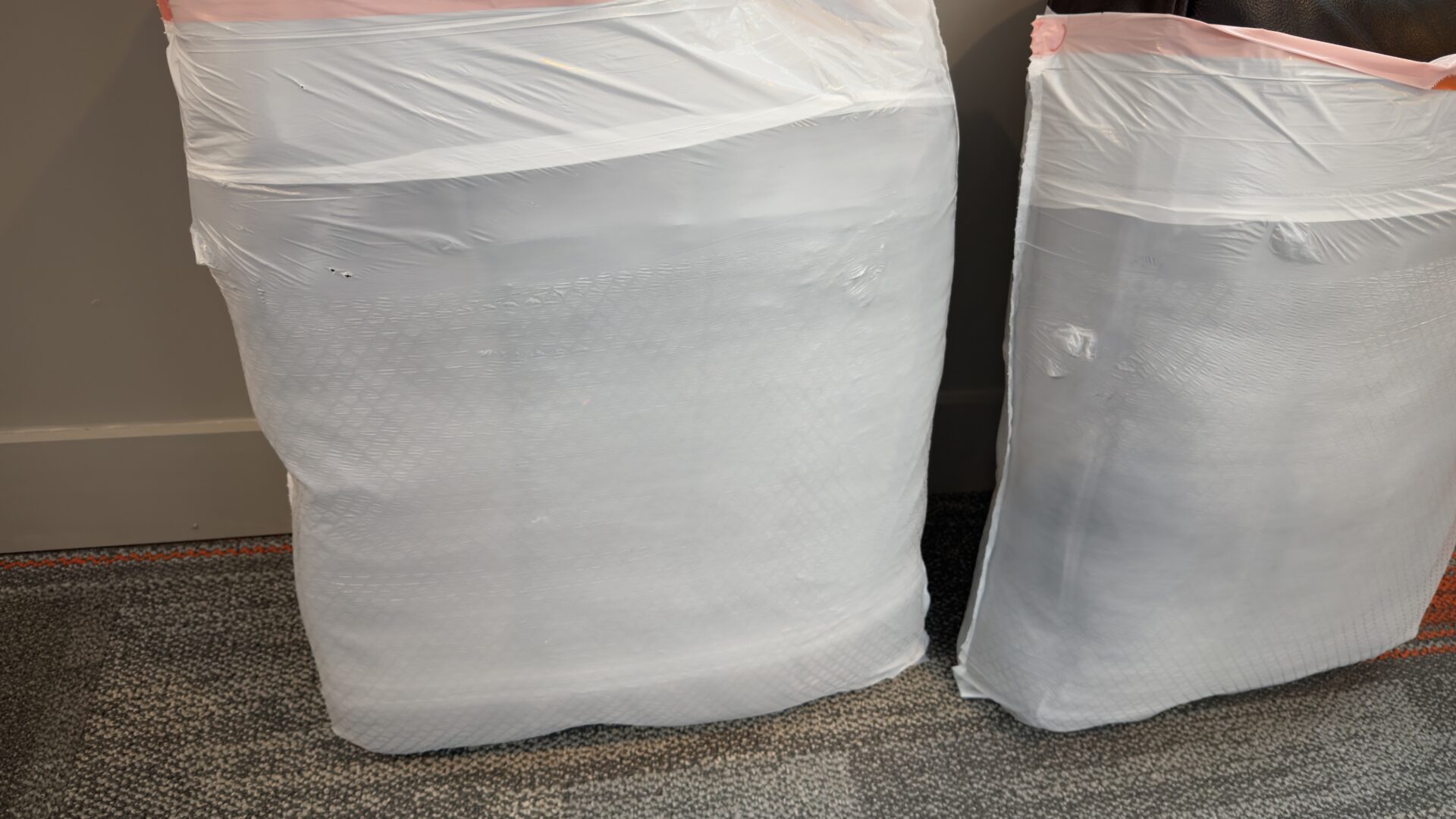 Delicate dessert glasses packed efficiently in divider crates.