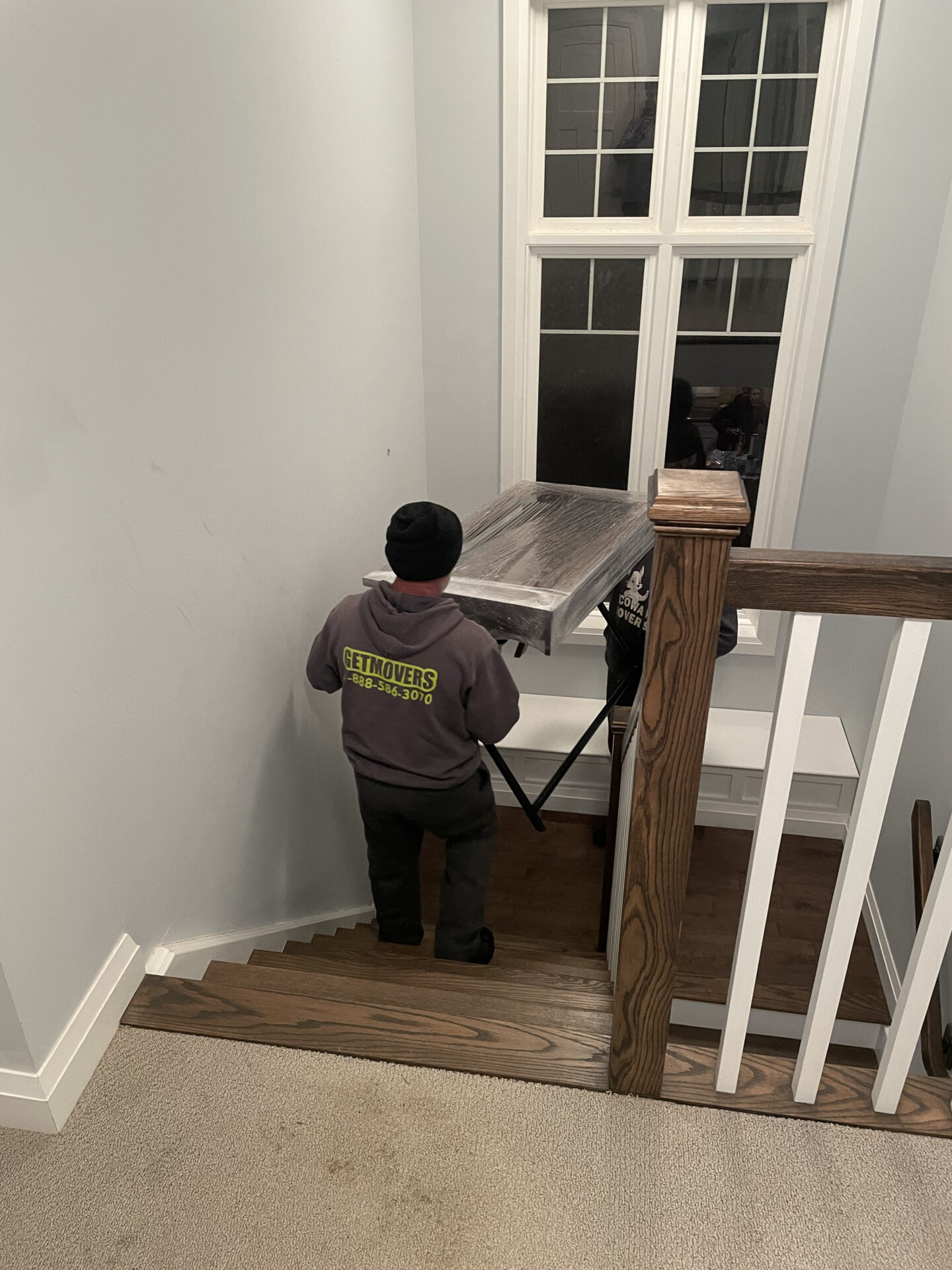 Crates with protective sleeves used for moving crystal glasses.