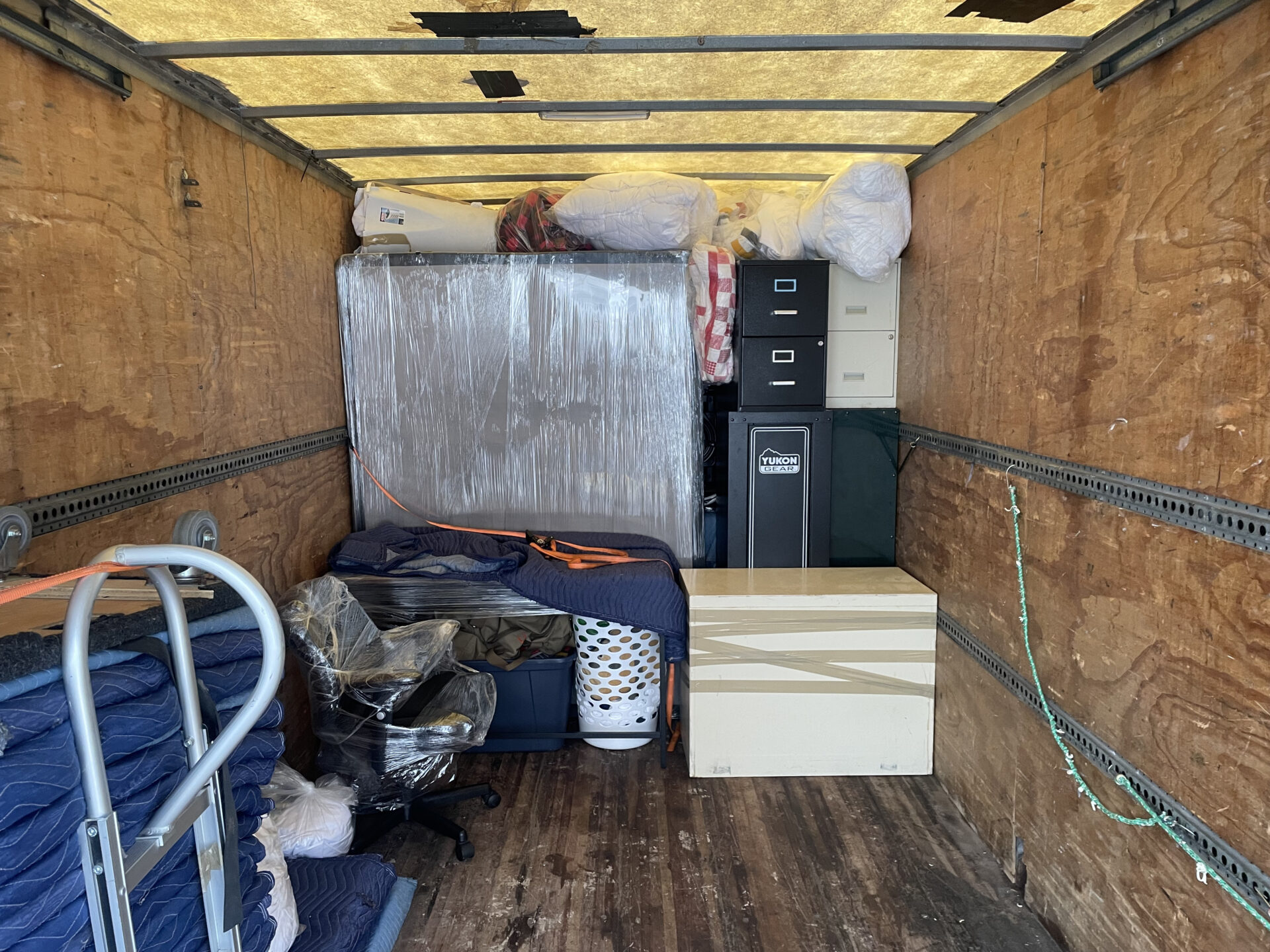 Protective floor runners laid out in a Cathedraltown home hallway.