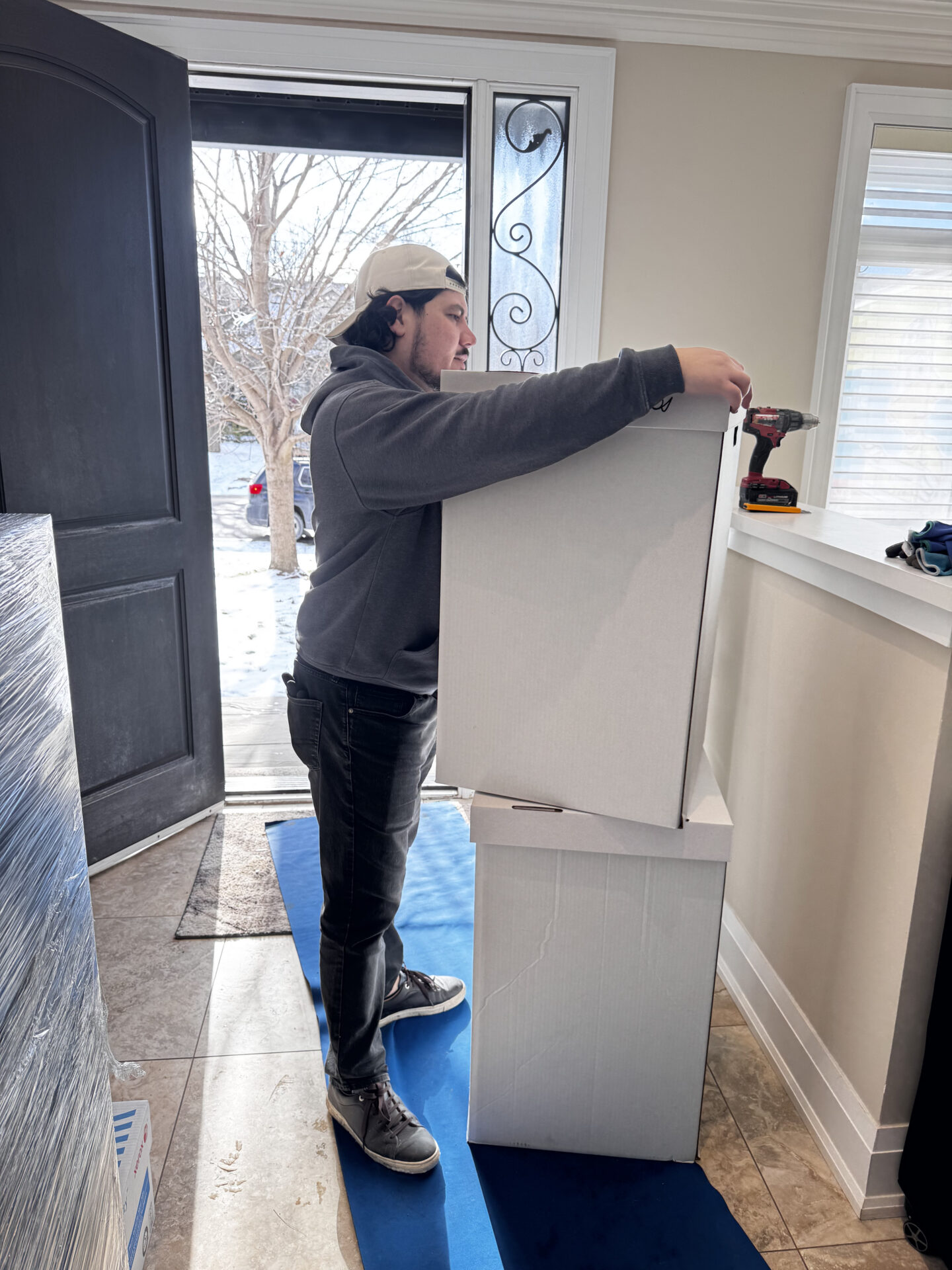 Delicate glass dishes packed securely in divider crates.