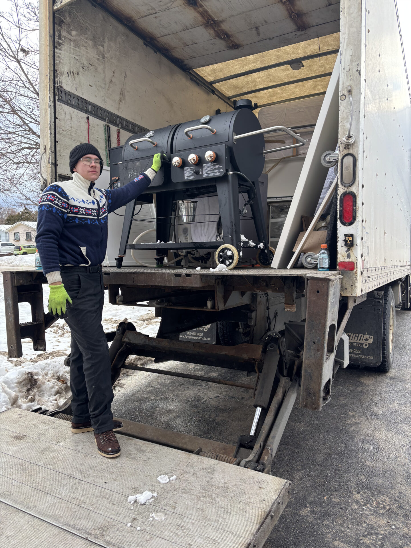 Priority cartons containing delicate glass items staged efficiently for transport during a Markham move.