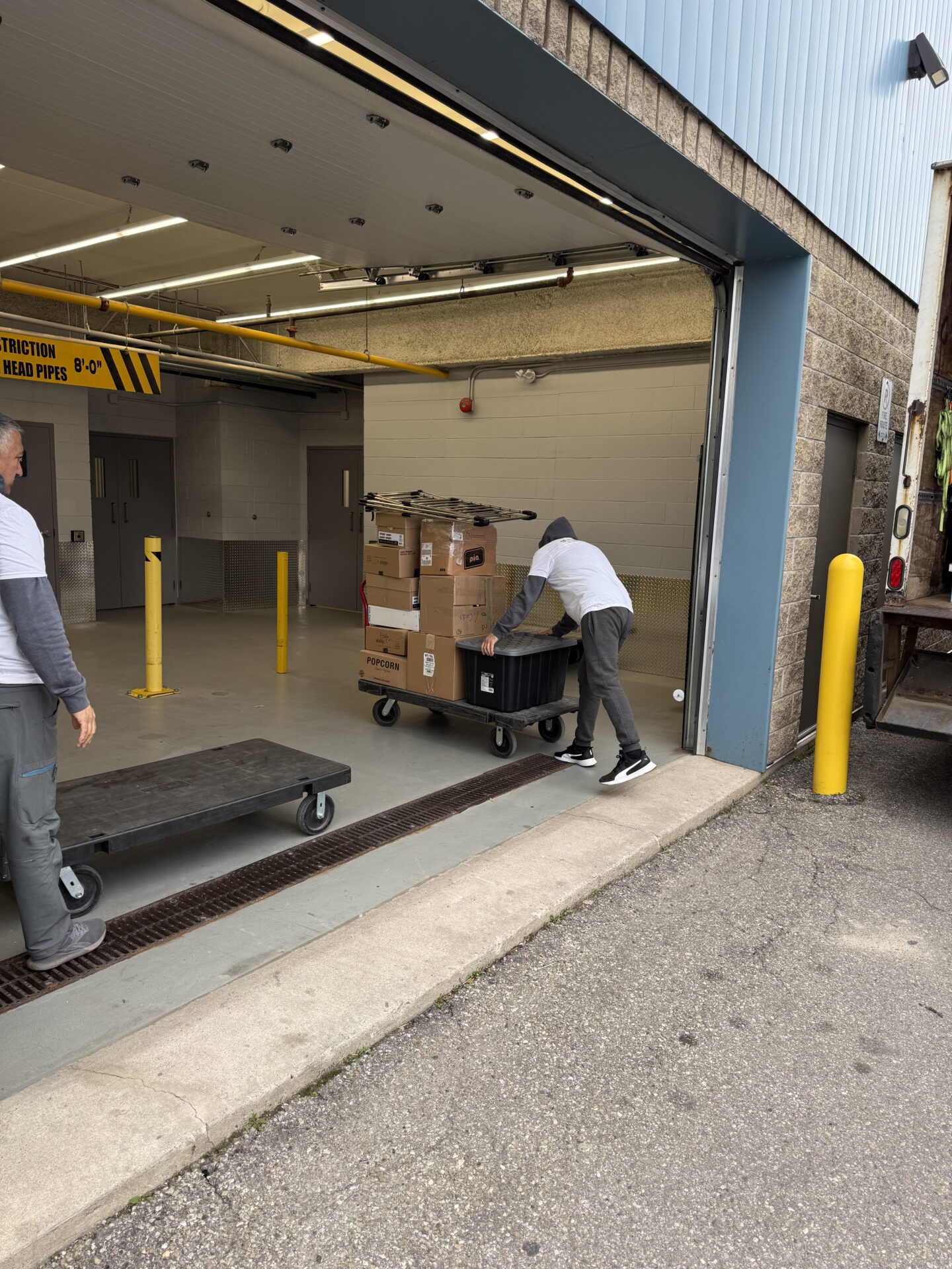 Display cabinet wrapped and secured for transit in Mississauga.