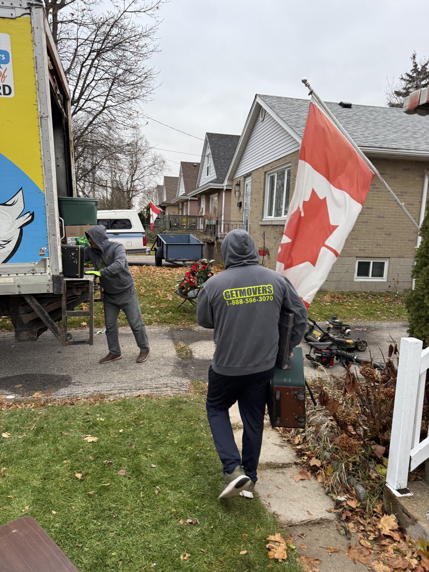 Movers maintaining a steady pace and clear pathways during a winter move in North York.