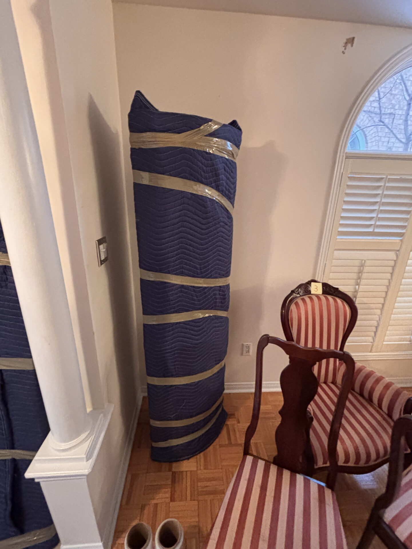 Priority cartons staged efficiently for transport during a Edmonton move.