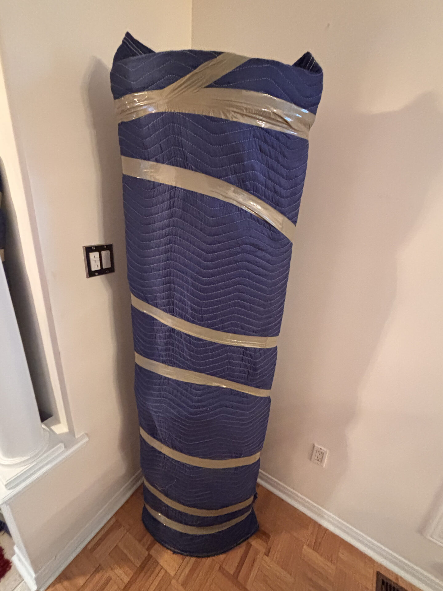 Priority cartons staged efficiently for transport during a Edmonton move.