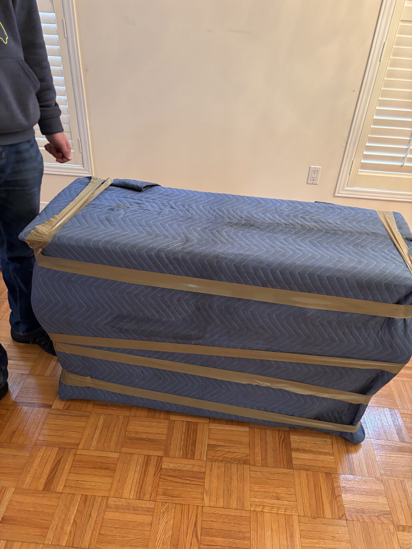 Crystal plates packed in reinforced crates for transport.