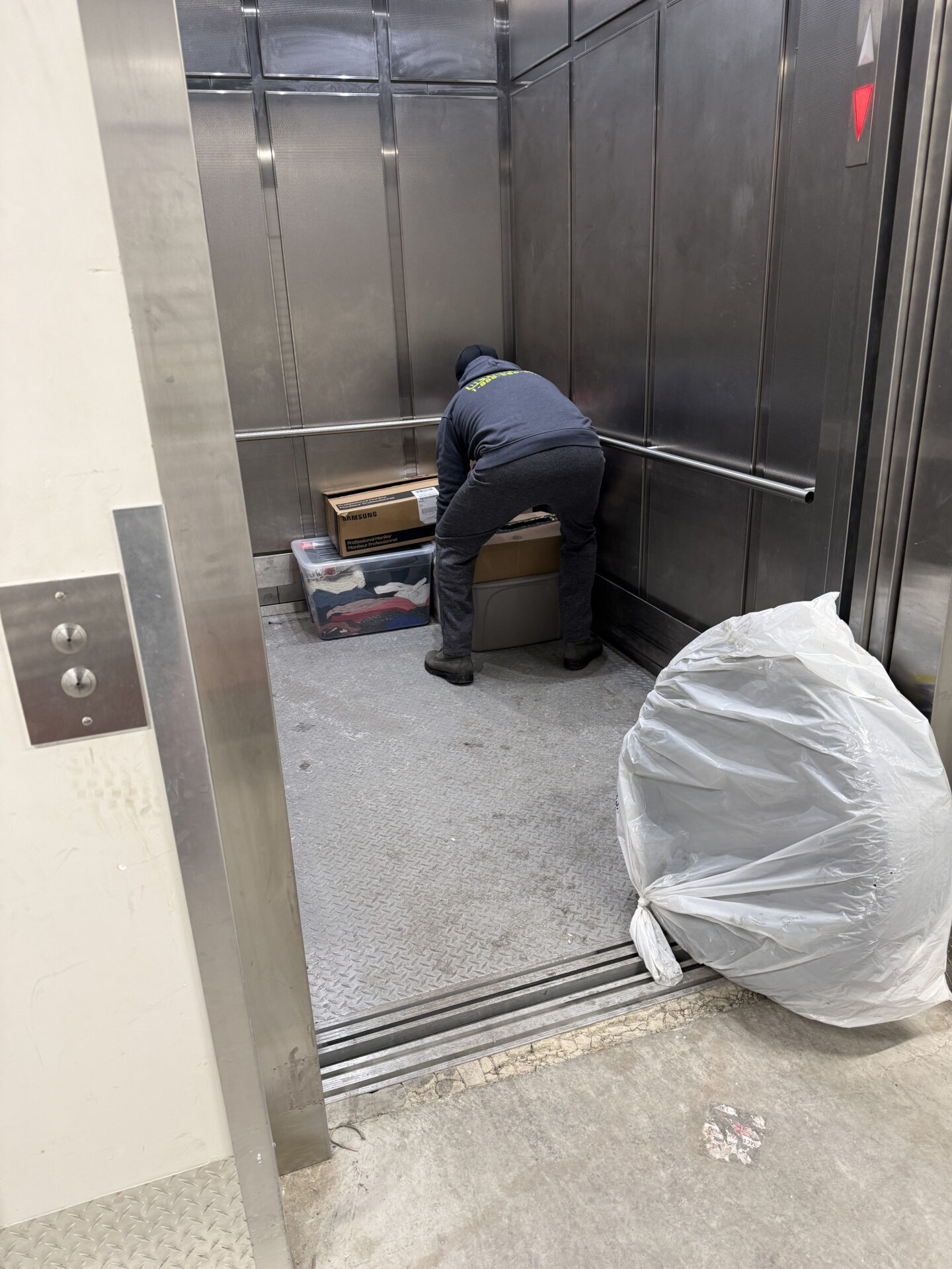Priority cartons staged efficiently for transport during a Markham move.