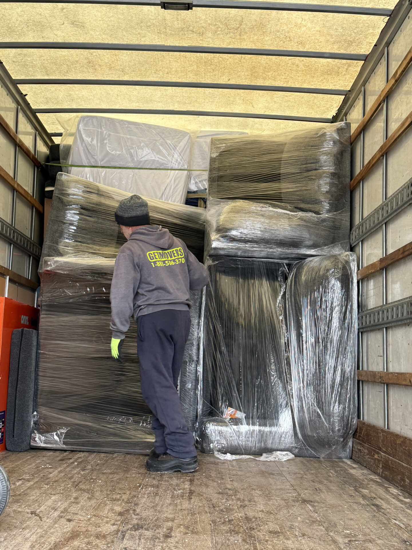 Movers loading truck in Kitsilano.