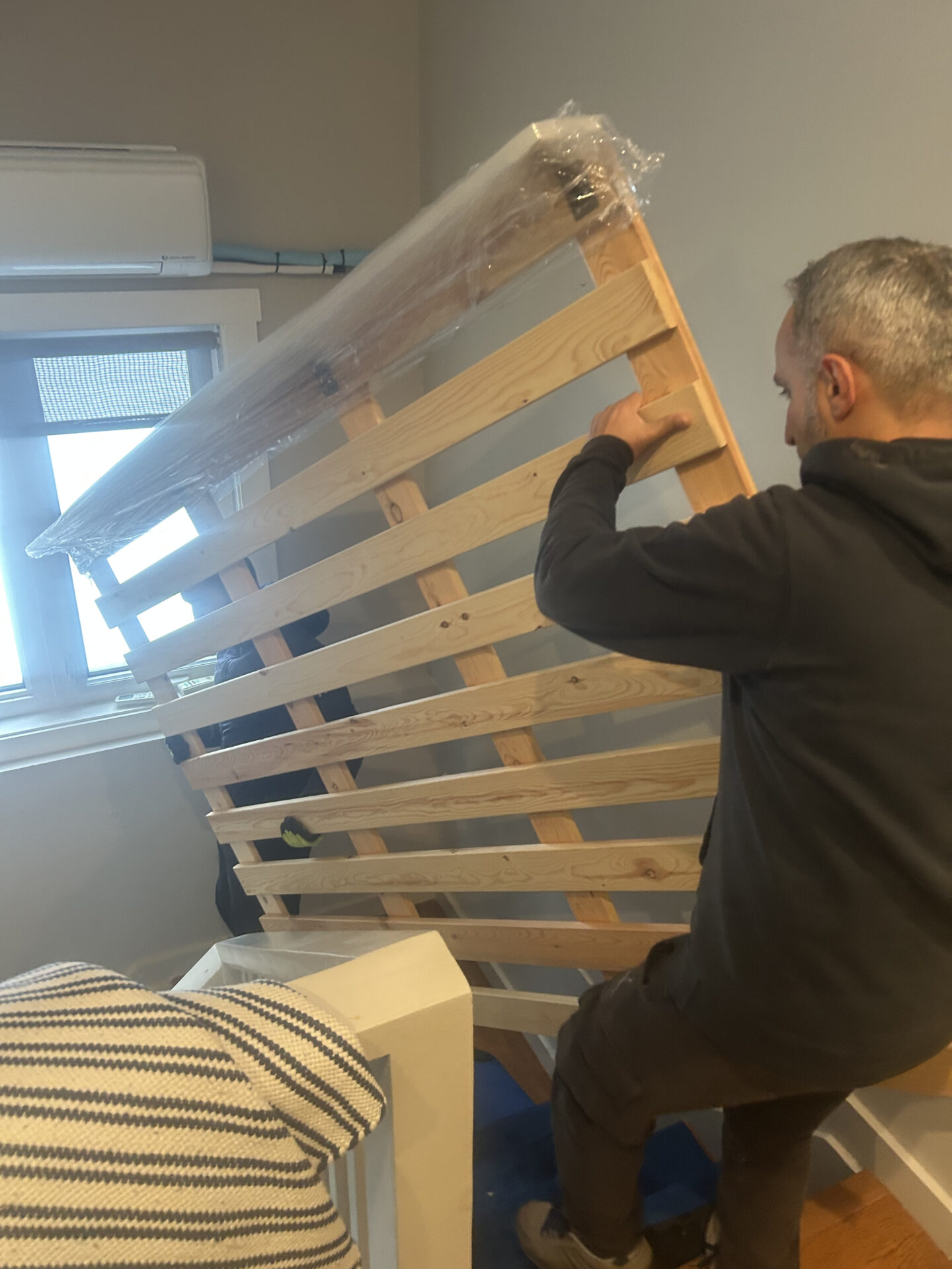 Professional movers clearing a path for safe loading in Brampton.