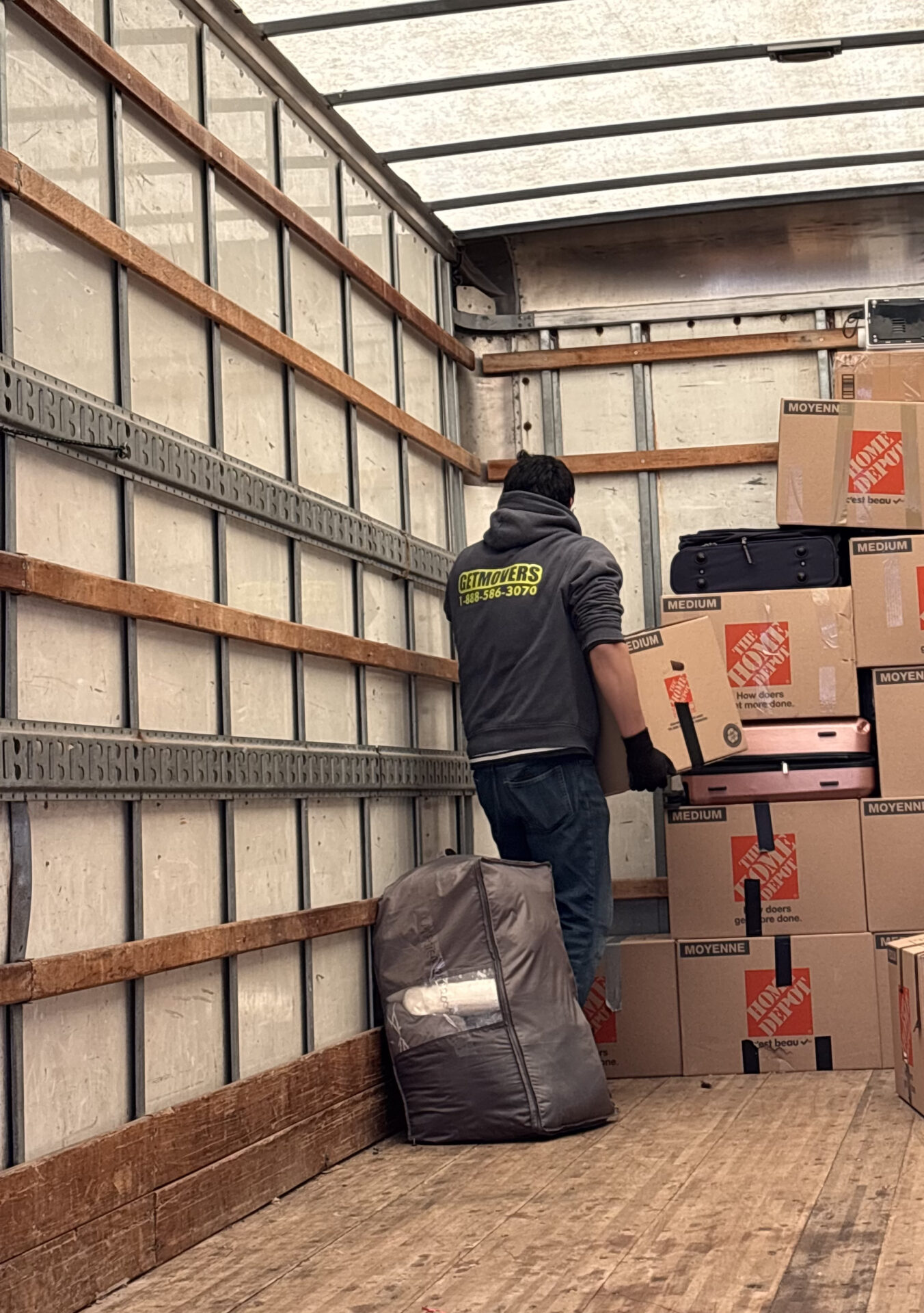 Protective floor runners laid out in Edmonton home to prevent snow tracking.