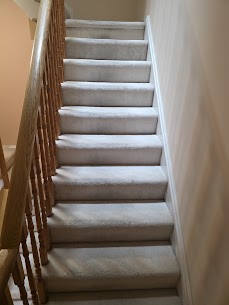 Movers carefully preparing furniture for a home move from Brightwood to Shannon Park in Halifax, ensuring safe winter transit.