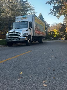 Movers carefully preparing furniture for a home move from Beechville to Shannon Park in Halifax, ensuring safe winter transit.