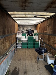 Movers carefully preparing furniture for a home move from Chelsea Green to West London in London, ensuring safe winter transit.
