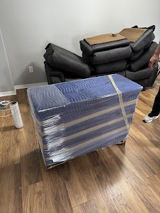 Movers carefully preparing furniture for a home move from Mongolia to Ringwood in Stouffville, ensuring safe winter transit.