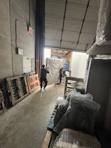 Movers carefully preparing furniture for a home move from Taunton to Pinecrest in Oshawa, ensuring safe winter transit.