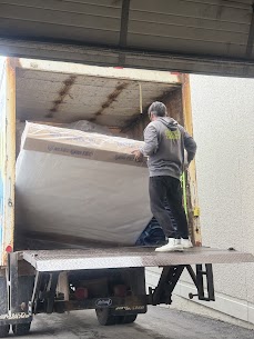Movers carefully preparing furniture for a home move from Bathurst Manor to Willowdale South in North York, ensuring safe winter transit.