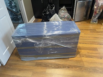 Movers carefully preparing furniture for a home move from Brownridge to Patterson in Thornhill, ensuring safe winter transit.