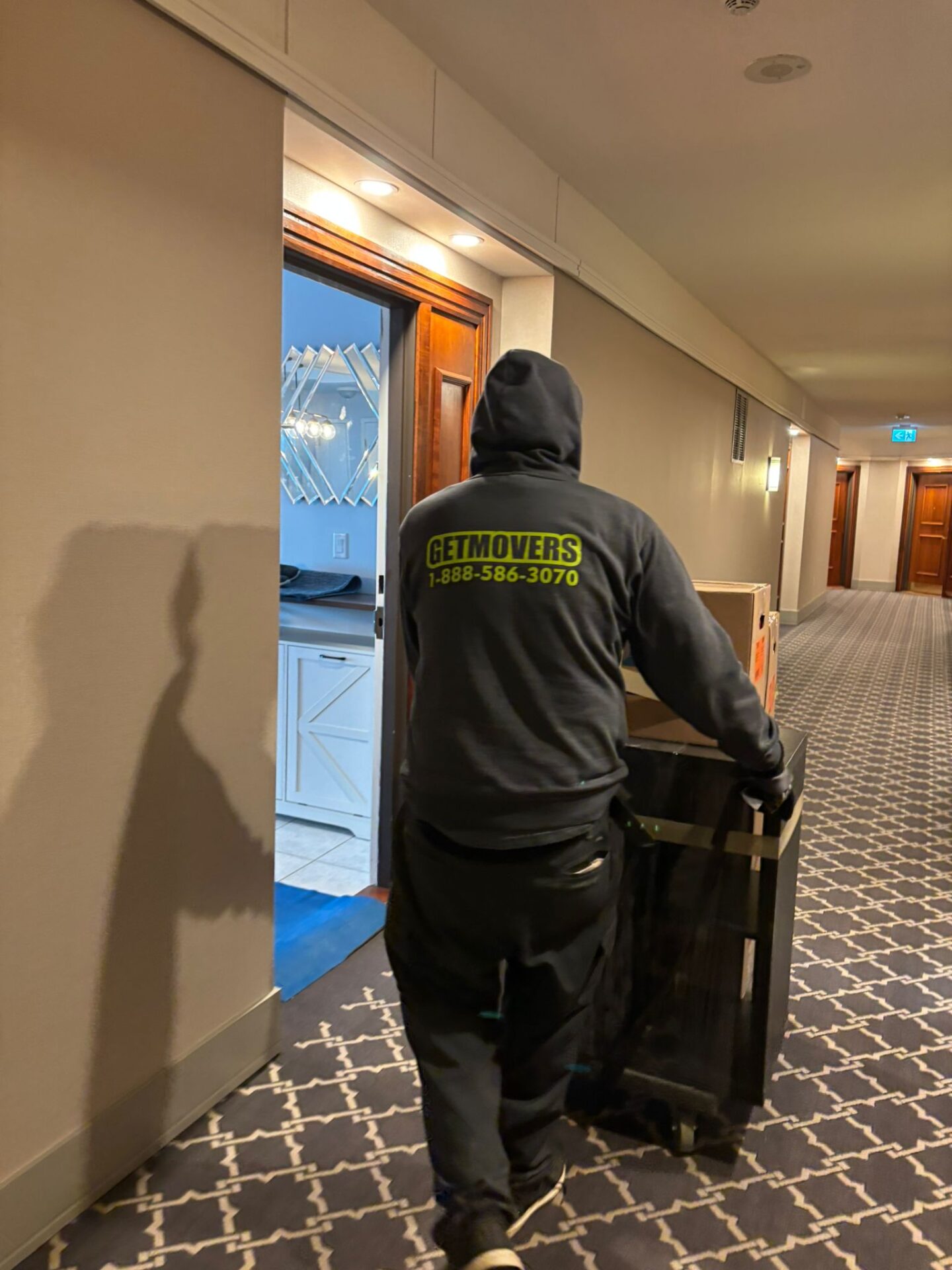 Priority cartons staged efficiently for transport during a London move.