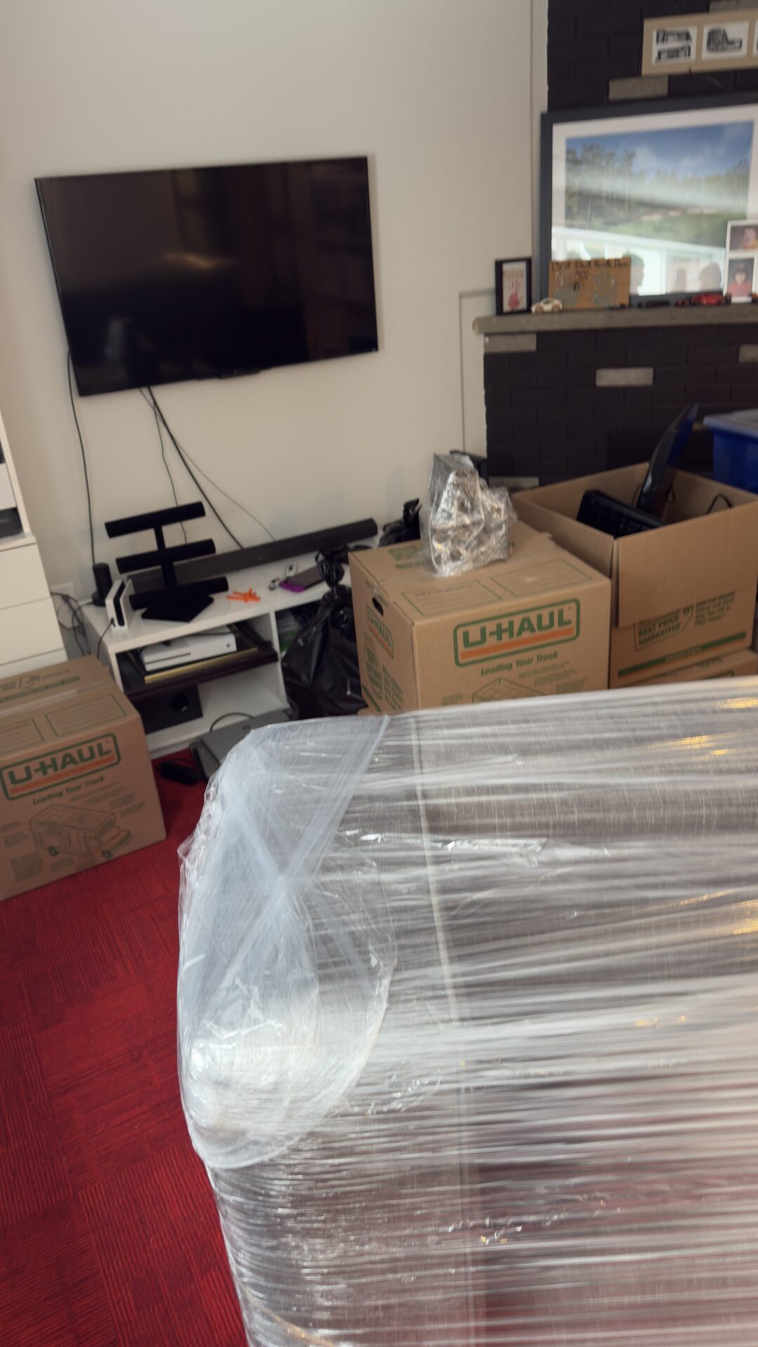 Fragile glass dessert plates packed in divider crates for transport.