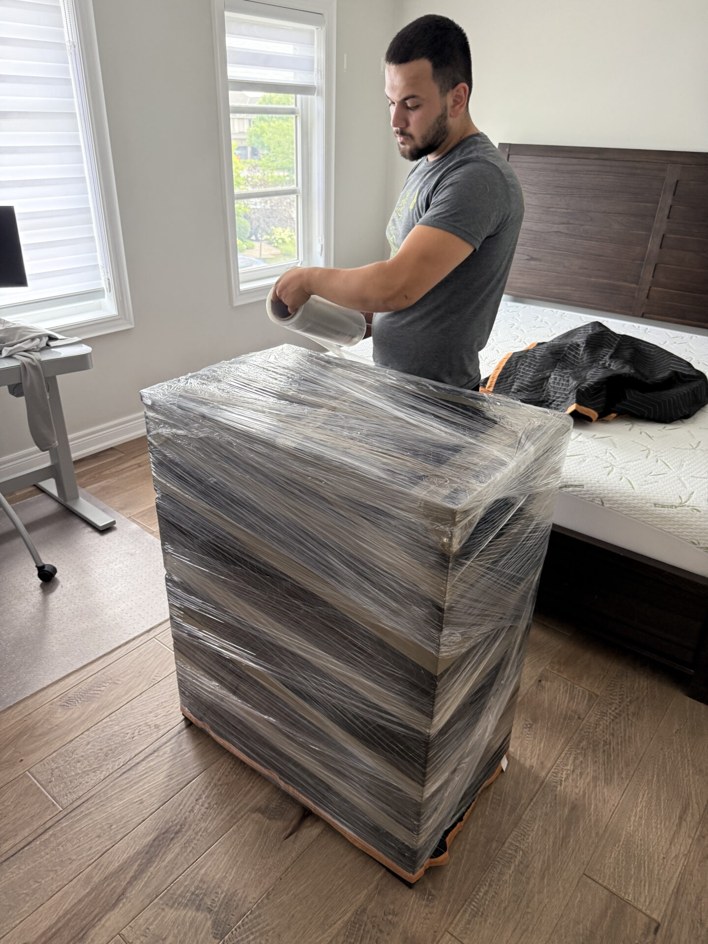 Fragile glass coasters packed in divider crates for safe transport.