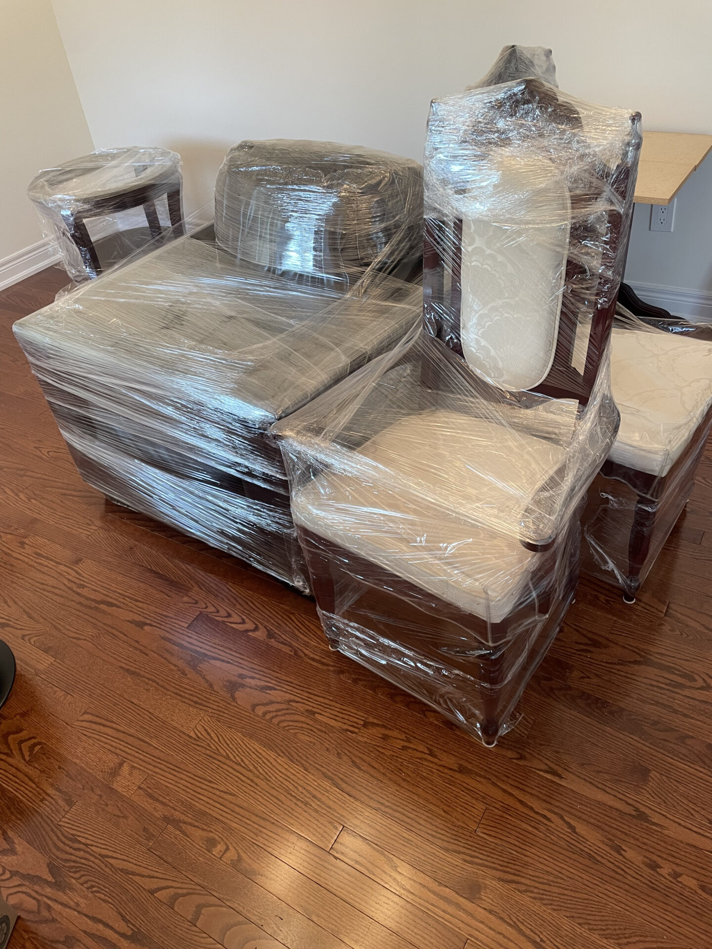 Movers keeping pathways clear of snow and slush at the Baker Dr residence.