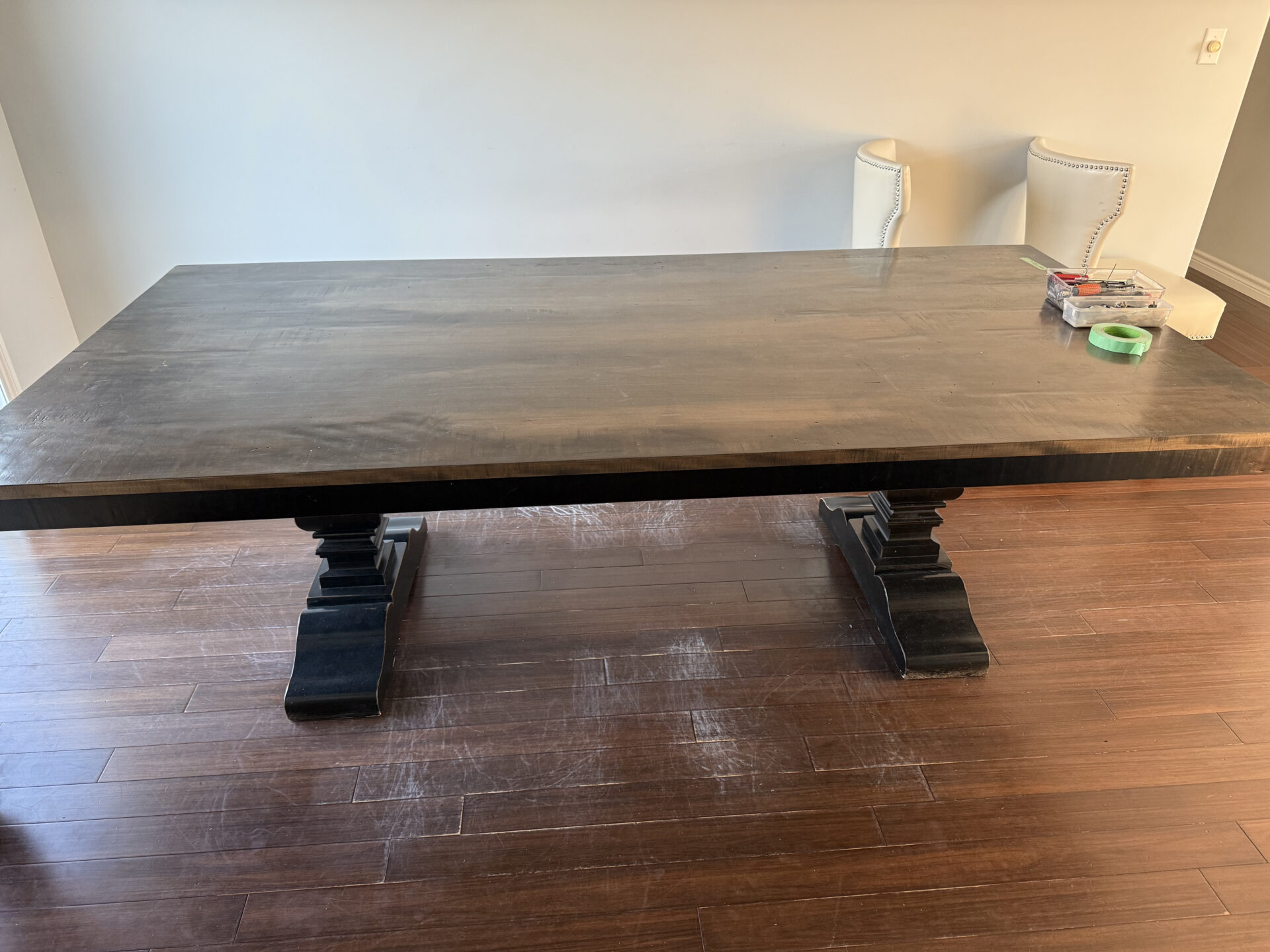 Professional movers maintaining clear pathways during the loading process in a Berkshire Village home.