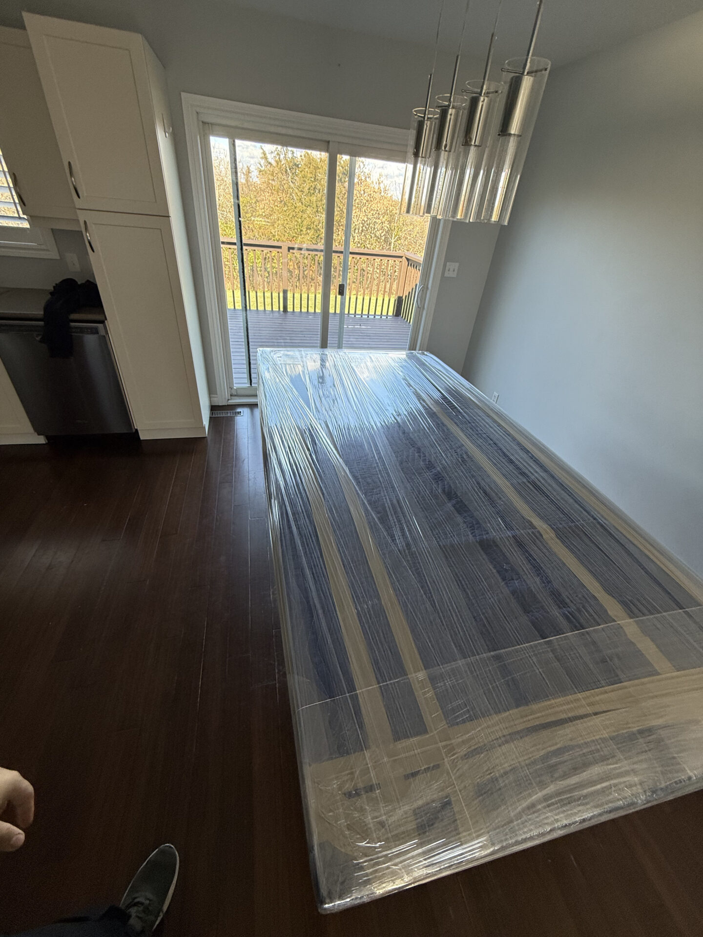 Fragile items like glass décor cushioned with layered padding for winter transport.