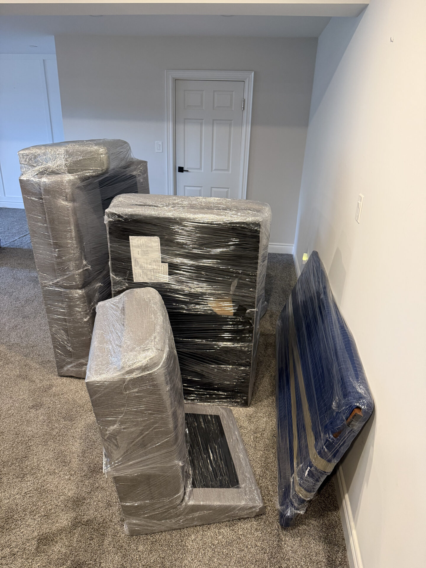 Fragile porcelain bowls packed in reinforced crates for safe transport.