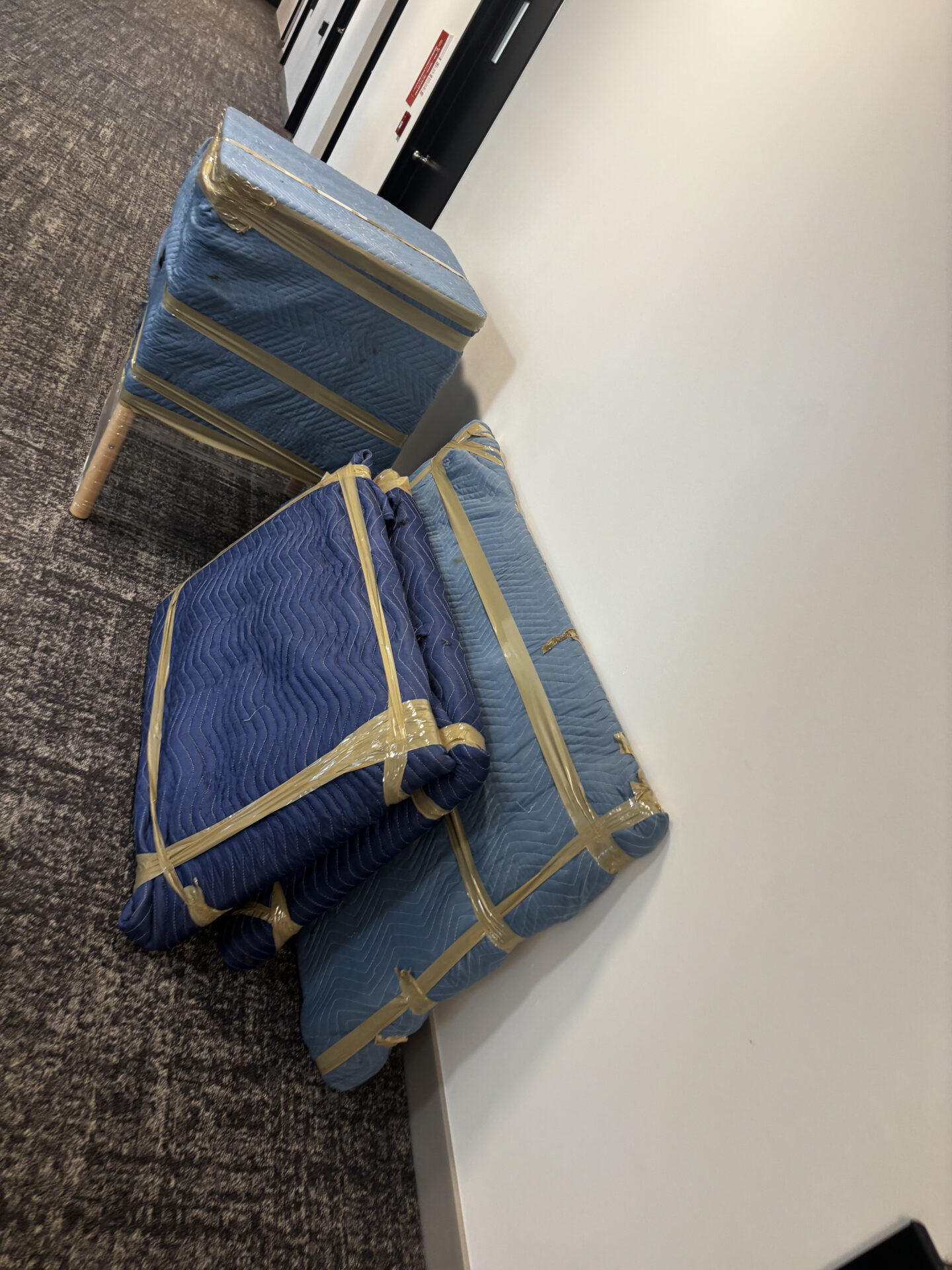 Floor runners laid down to protect hardwood floors from winter boots in Oshawa.