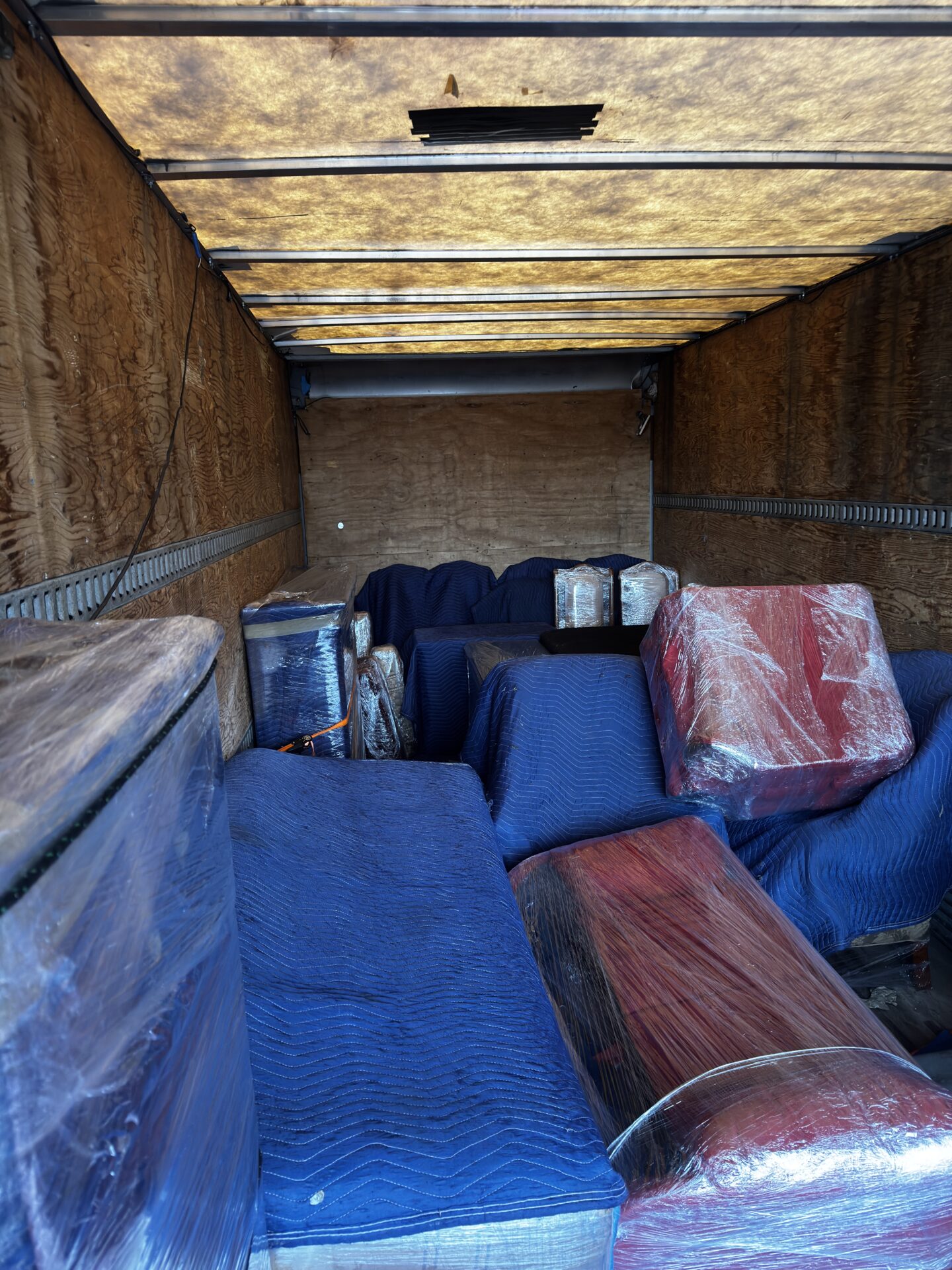 Priority cartons containing delicate glassware staged efficiently for transport during a Halifax move.