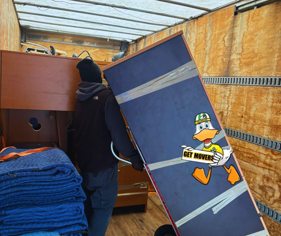 Priority crystal cartons staged efficiently for transport during a London move.