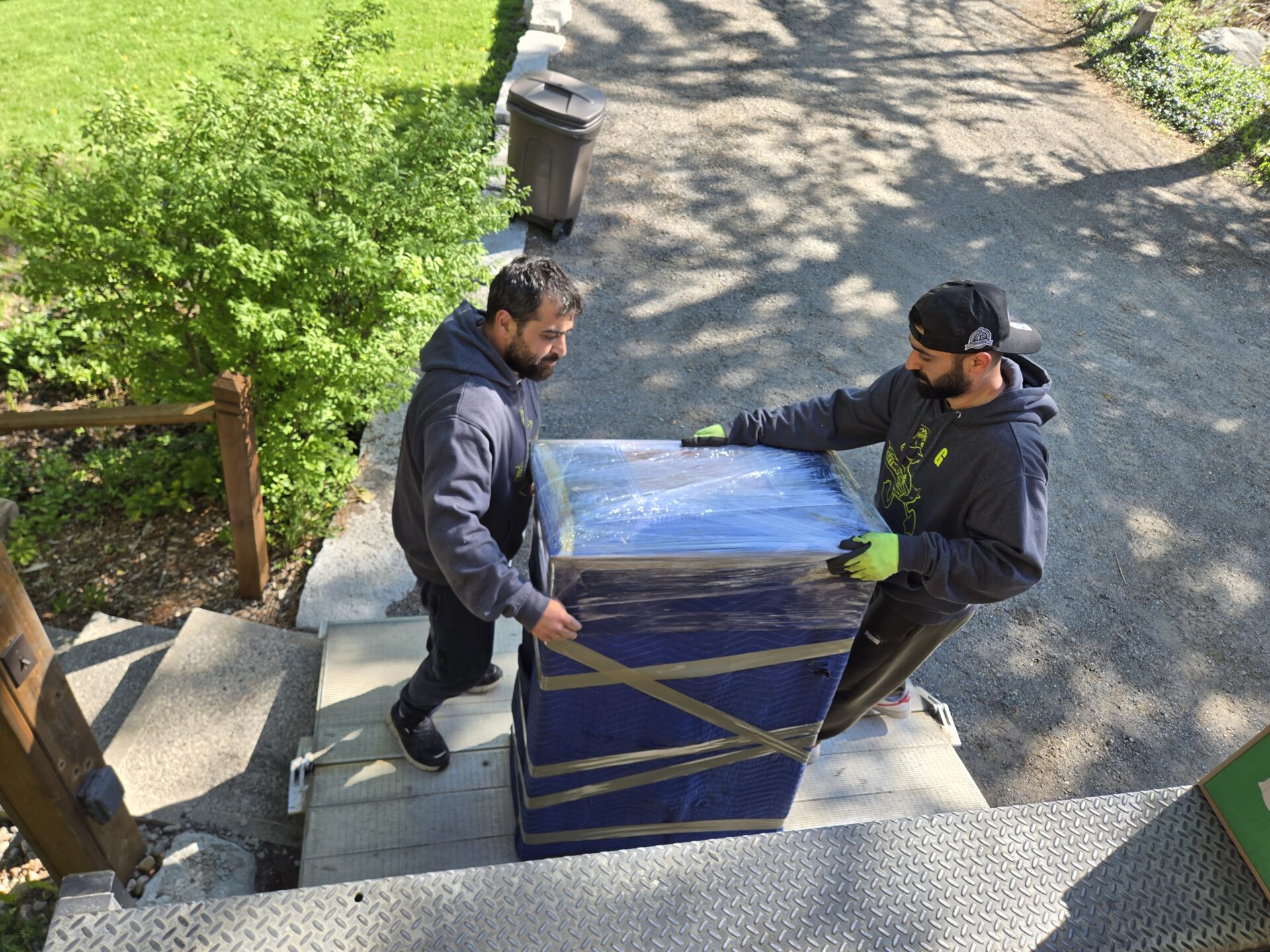 Carefully wrapping furniture for moving day