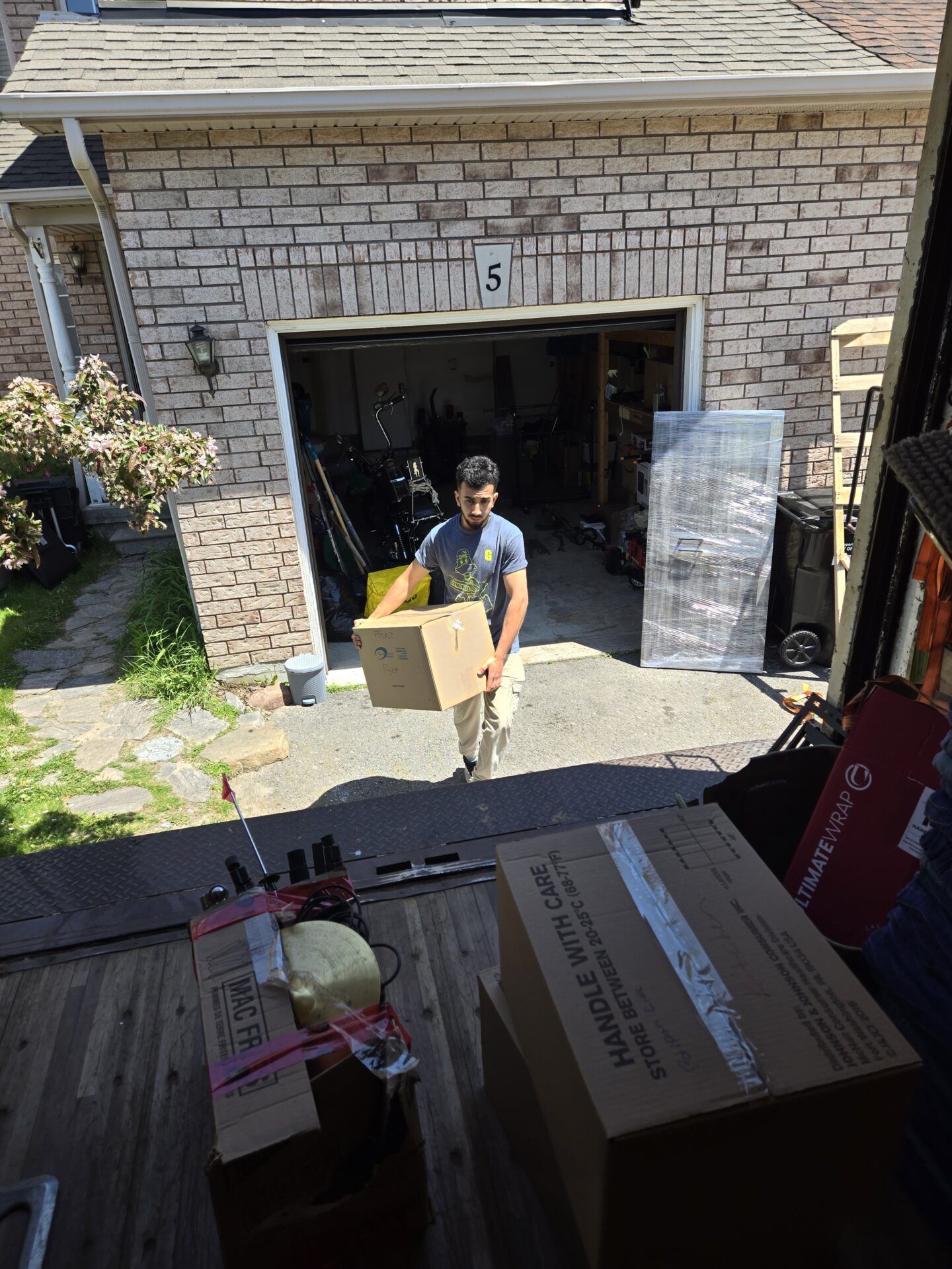Professional movers handling furniture